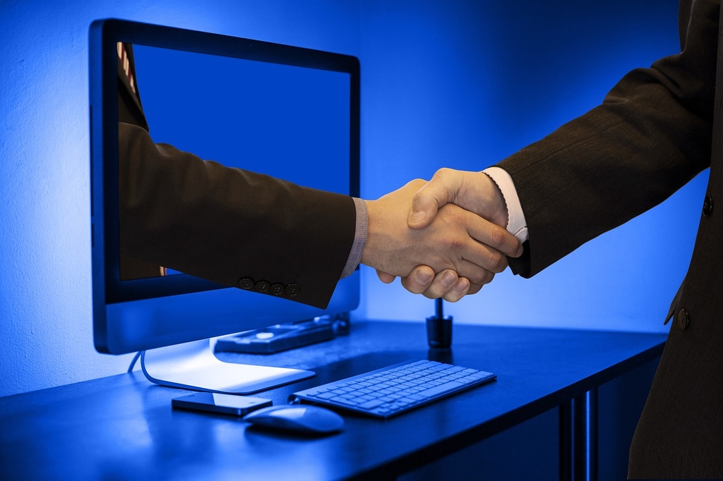 How can a well-designed website improve customer trust and engagement?